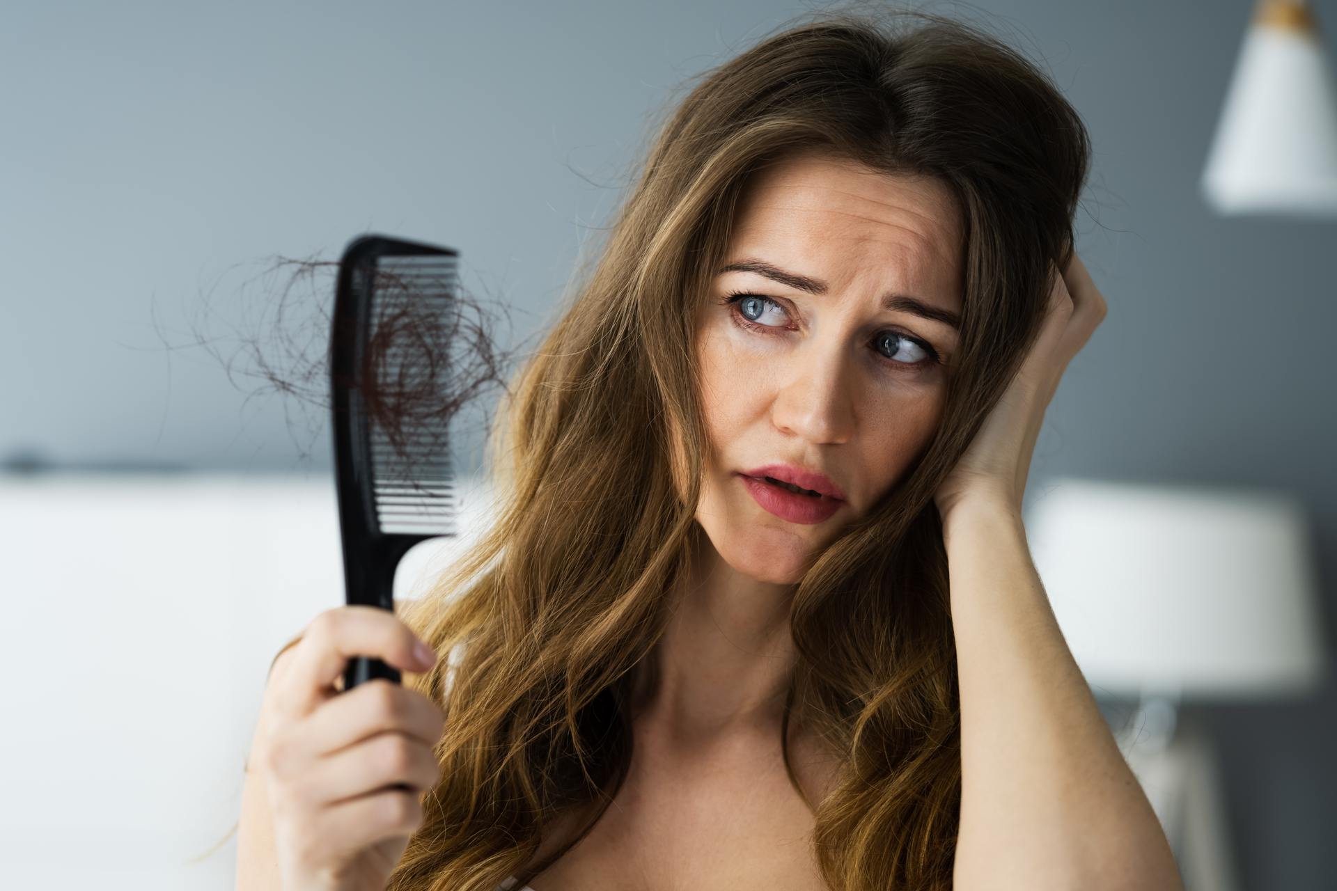 Woman Suffering From Hair loss Problem